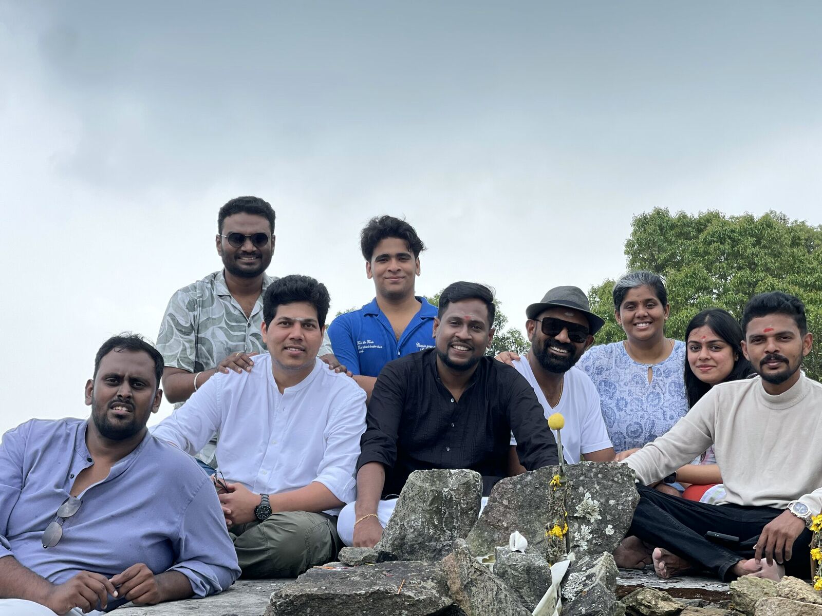 The AyC Tribe gathered together on a misty hilltop after trekking into the forest