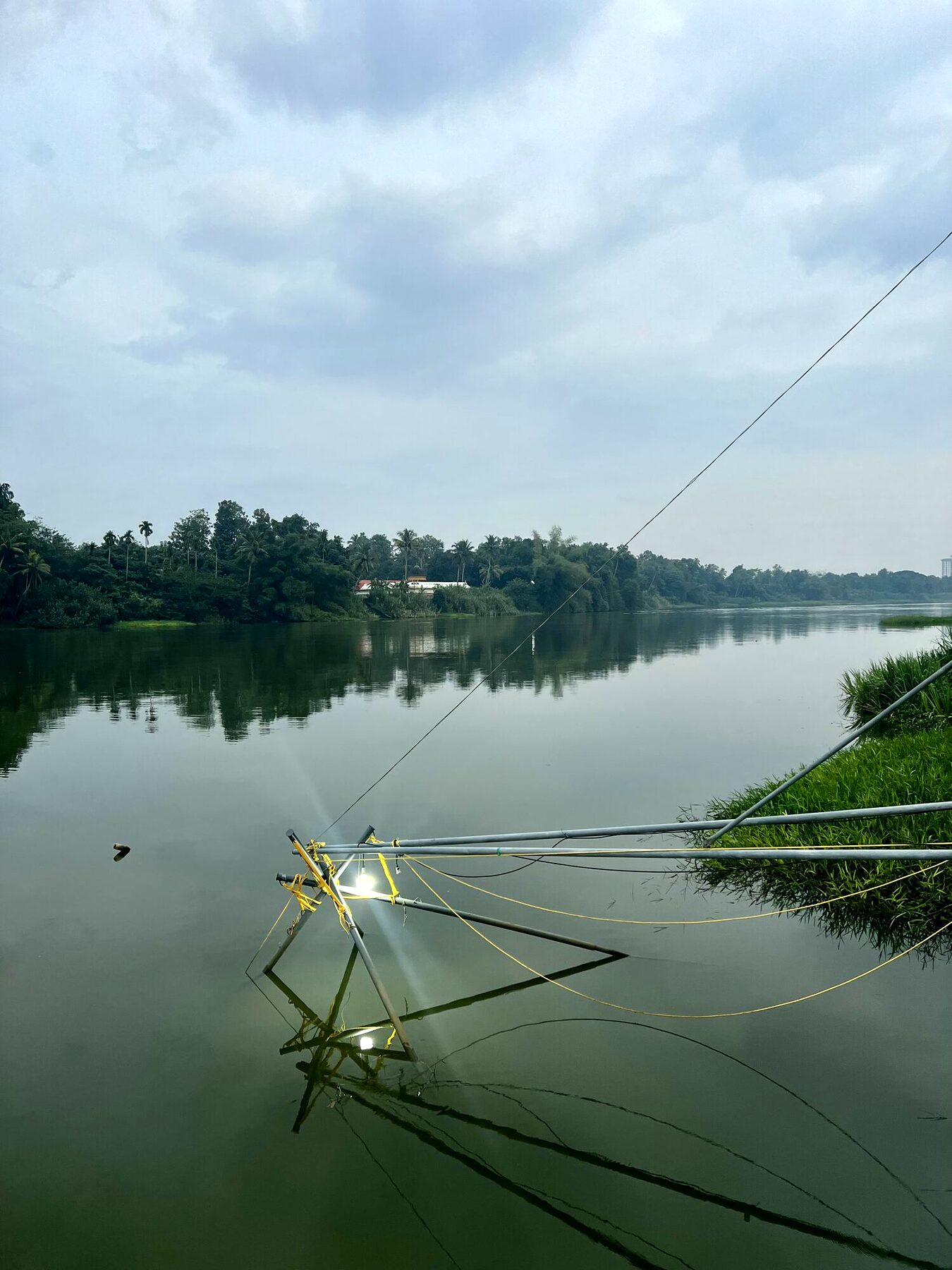 A strategy session seen through a rain-streaked glass wall