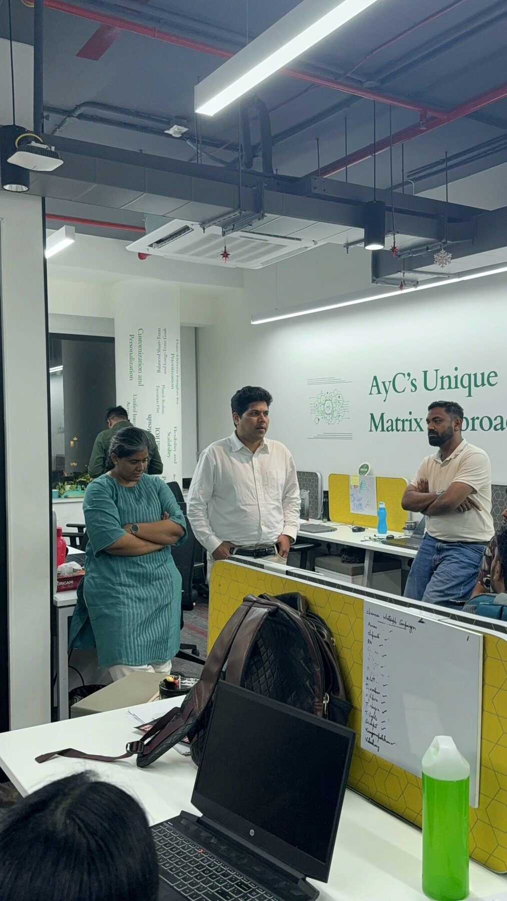 The AyC Tribe in an office working session
